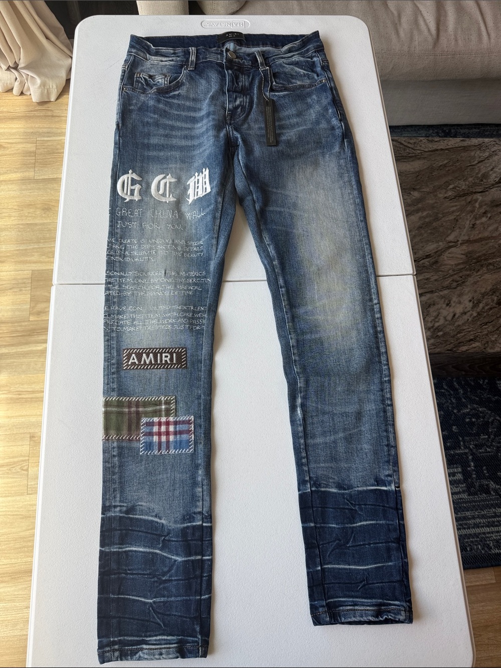 AMIRI Men's Blue Distressed Skinny Jeans with Patchwork and Graphic Print
